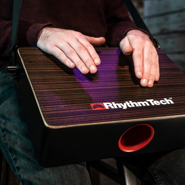 man's hands playing Rhythm Tech Bongo Cajon