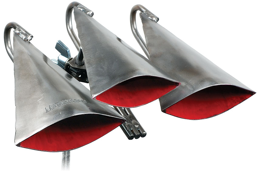 closeup of triple timbale bells