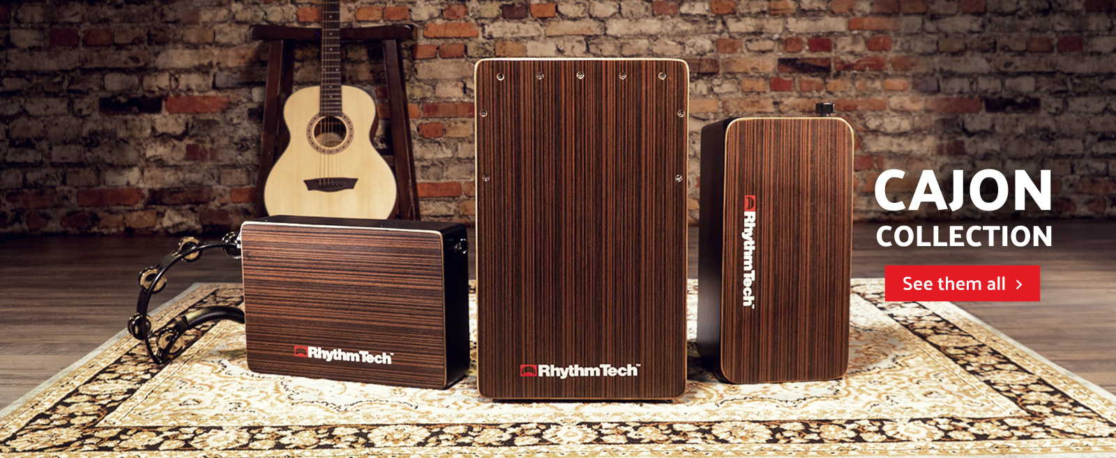 Three Rhythm Tech cajons in front of brick wall